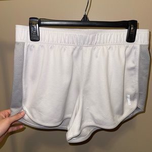 White and grey athletic shorts